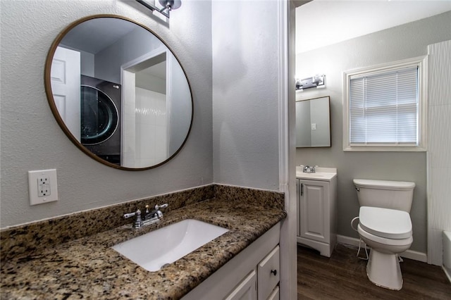 4001 Cott St, Corpus Christi, TX 78411 - bathroom featuring wood finished floors, vanity, and toilet