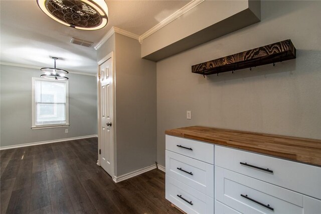 4001 Cott St, Corpus Christi, TX 78411 - hall with ornamental molding, dark wood finished floors, and baseboards