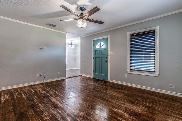 4001 Cott St, Corpus Christi, TX 78411 - foyer with hardwood / wood-style flooring, ceiling fan, a chandelier, ornamental molding, and baseboards