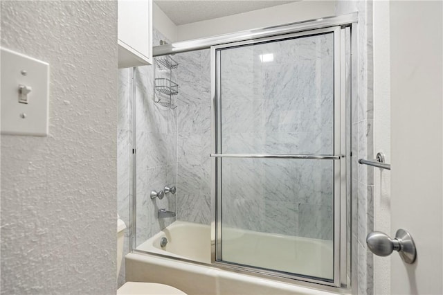 full bathroom with enclosed tub / shower combo, a textured wall, a textured ceiling, and toilet