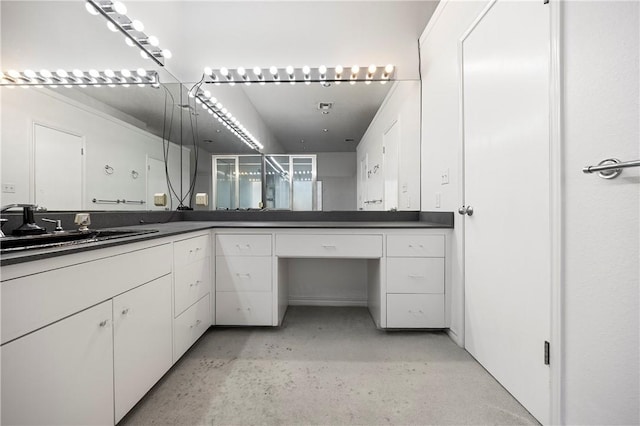 full bathroom featuring carpet floors, vanity, and a shower stall