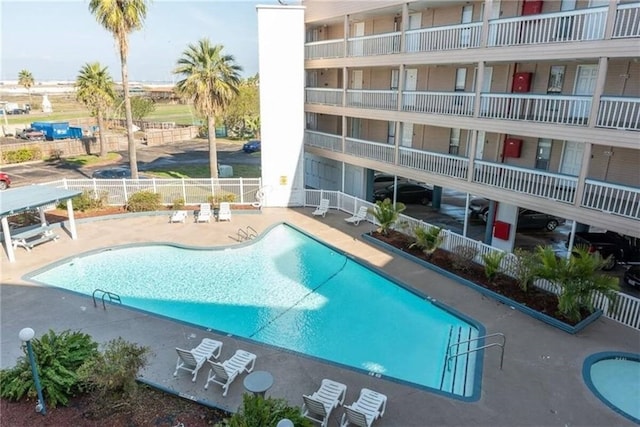 3938 Surfside Blvd Unit 3129, Corpus Christi, TX 78402 - community pool featuring a patio area