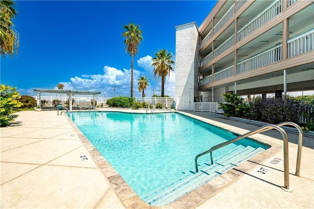 3938 Surfside Blvd Unit 3129, Corpus Christi, TX 78402 - community pool featuring a patio
