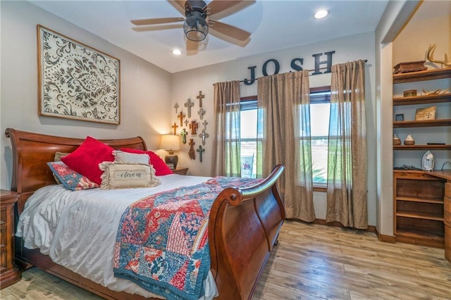 bedroom featuring ceiling fan and wood-type flooring