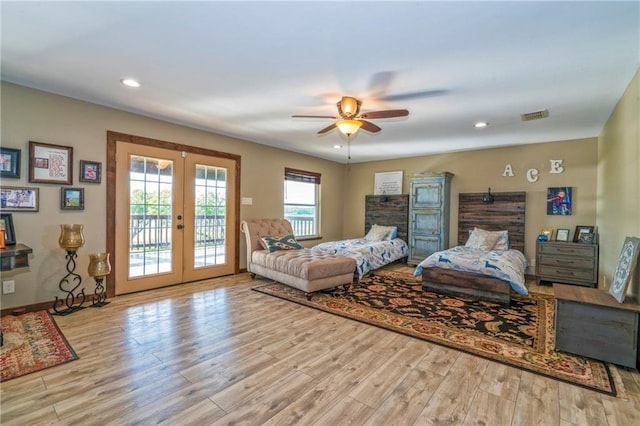 bedroom featuring french doors, ceiling fan, access to exterior, and light hardwood / wood-style floors