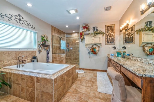 bathroom with vanity and plus walk in shower