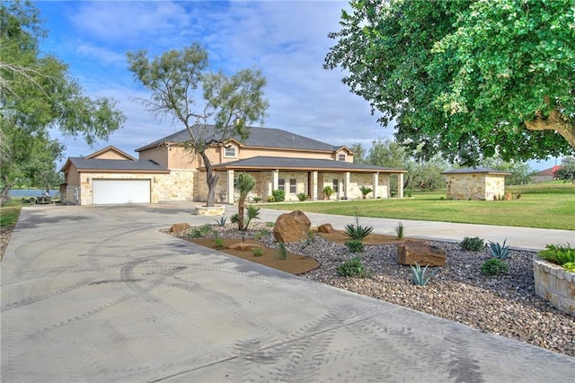 ranch-style home featuring a garage and a front yard