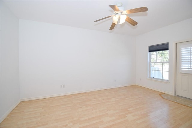 unfurnished room featuring light hardwood / wood-style floors and ceiling fan