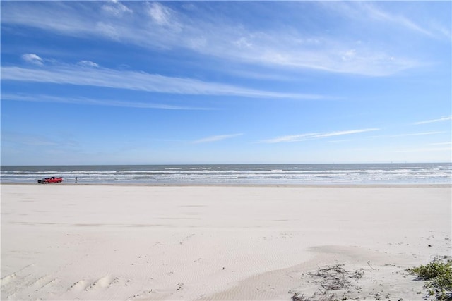 view of water feature with a beach view