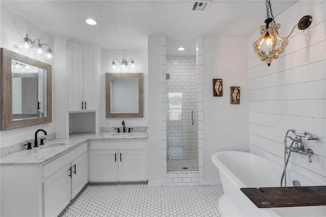 bathroom featuring vanity, tile patterned floors, and independent shower and bath