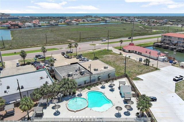 birds eye view of property featuring a water view