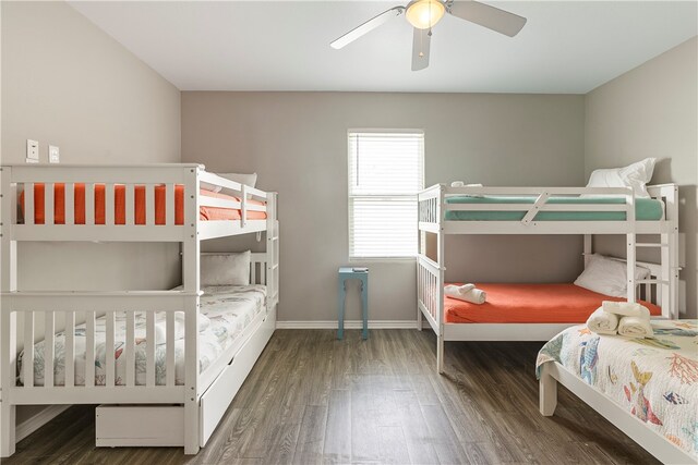 bedroom with dark wood-type flooring and ceiling fan