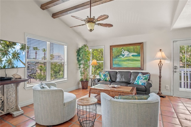 living room featuring light tile patterned floors, vaulted ceiling with beams, a healthy amount of sunlight, and ceiling fan