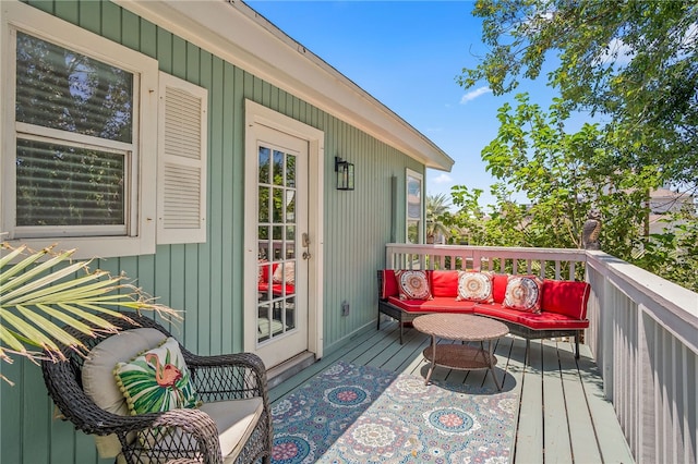 deck with an outdoor hangout area