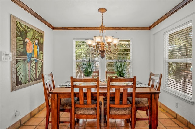 tiled dining area featuring ornamental molding and a notable chandelier