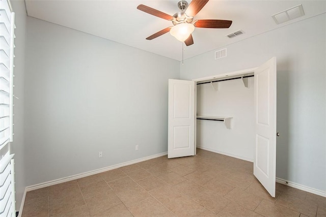 unfurnished bedroom featuring a closet, visible vents, and a ceiling fan