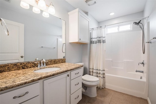 bathroom featuring toilet, shower / tub combo, tile patterned floors, visible vents, and vanity