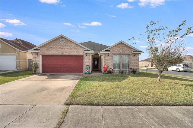 ranch-style house featuring a front yard and a garage