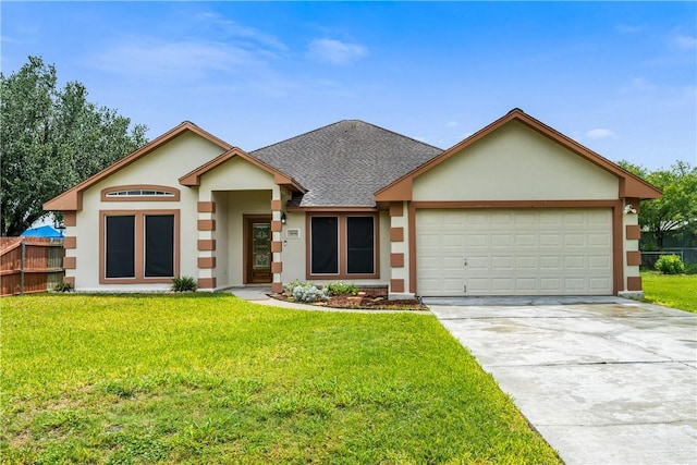 3606 Emory Dr, Corpus Christi, TX 78410 - view of front of property featuring stucco siding, a shingled roof, an attached garage, and driveway