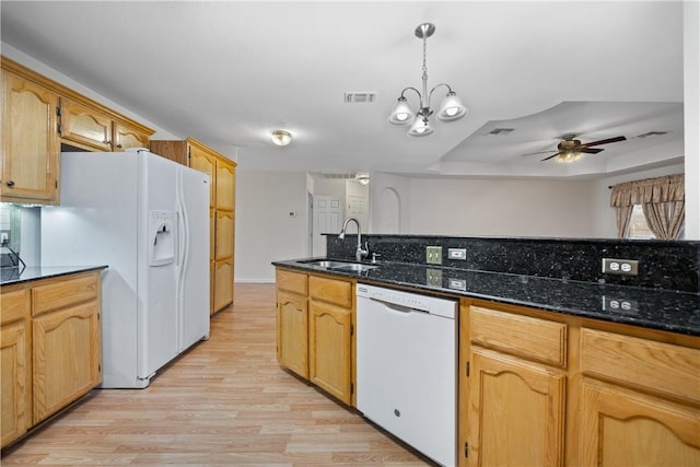 3606 Emory Dr, Corpus Christi, TX 78410 - kitchen with white appliances, light wood finished floors, ceiling fan, pendant lighting, and a tray ceiling