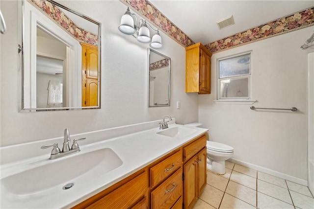 3606 Emory Dr, Corpus Christi, TX 78410 - full bathroom with double vanity, tile patterned flooring, and a bathtub