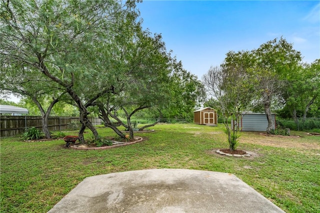 3606 Emory Dr, Corpus Christi, TX 78410 - fenced backyard featuring a storage shed and a patio