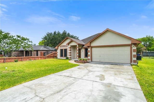 3606 Emory Dr, Corpus Christi, TX 78410 - ranch-style house with stucco siding, a garage, and driveway