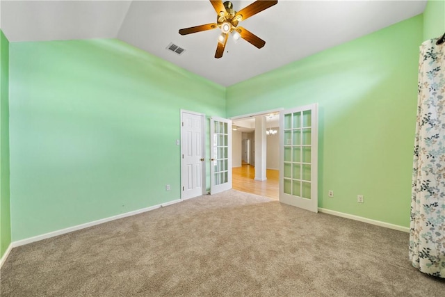 3606 Emory Dr, Corpus Christi, TX 78410 - unfurnished bedroom with french doors, carpet floors, vaulted ceiling, and ceiling fan