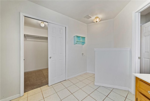 3606 Emory Dr, Corpus Christi, TX 78410 - unfurnished bedroom featuring a closet and light tile patterned flooring