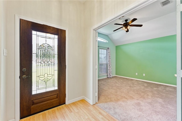 3606 Emory Dr, Corpus Christi, TX 78410 - carpeted entrance foyer with vaulted ceiling, ceiling fan, and wood finished floors