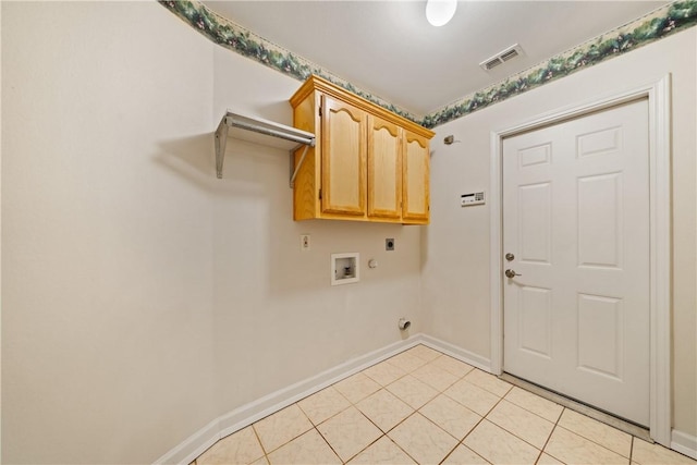 3606 Emory Dr, Corpus Christi, TX 78410 - laundry room featuring electric dryer hookup, hookup for a washing machine, cabinet space, light tile patterned floors, and gas dryer hookup