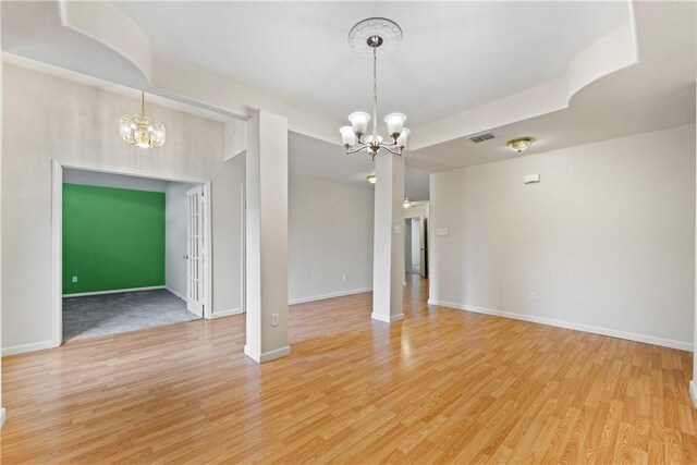 3606 Emory Dr, Corpus Christi, TX 78410 - spare room featuring a chandelier and light wood finished floors