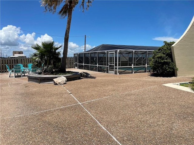 4242 Gulfbreeze Blvd Unit 606, Corpus Christi, TX 78402 - view of yard with a pool, a patio, and glass enclosure
