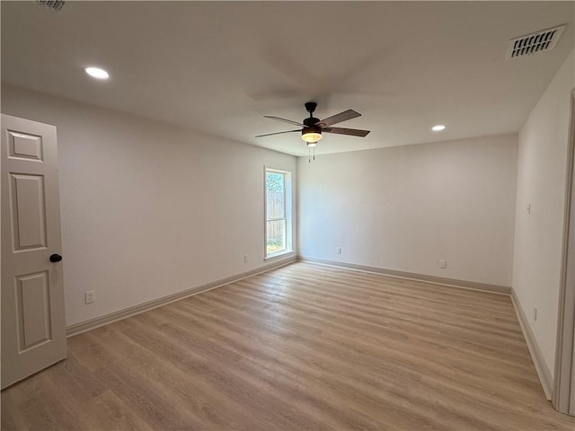 2413 Still Brook Dr, Corpus Christi, TX 78414 - empty room featuring light wood finished floors, visible vents, baseboards, and a ceiling fan