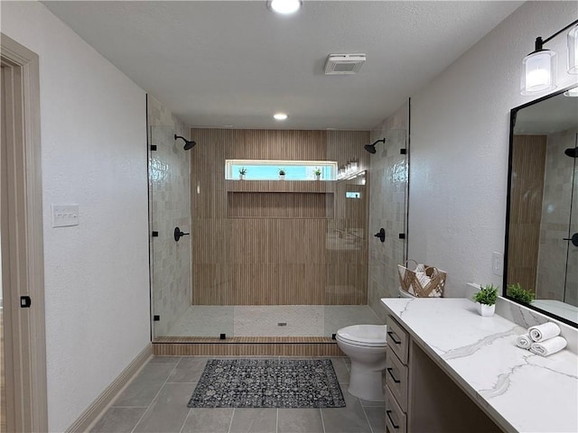 2413 Still Brook Dr, Corpus Christi, TX 78414 - full bathroom with toilet, tiled shower, vanity, and visible vents