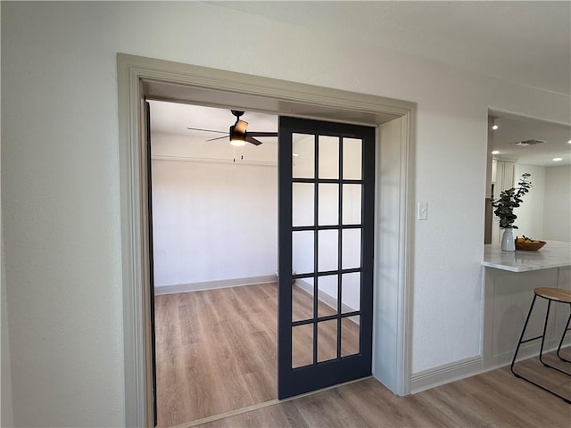 2413 Still Brook Dr, Corpus Christi, TX 78414 - corridor with wood finished floors, baseboards, and visible vents