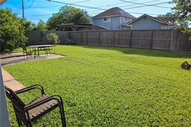 4625 Mildred Dr, Corpus Christi, TX 78411 - view of yard featuring a patio and a fenced backyard