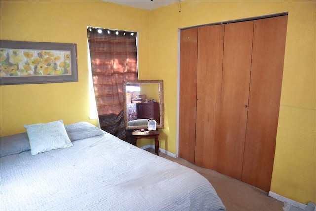 4625 Mildred Dr, Corpus Christi, TX 78411 - bedroom with baseboards, carpet flooring, and a closet