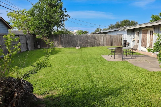 4625 Mildred Dr, Corpus Christi, TX 78411 - view of yard featuring a patio area and a fenced backyard