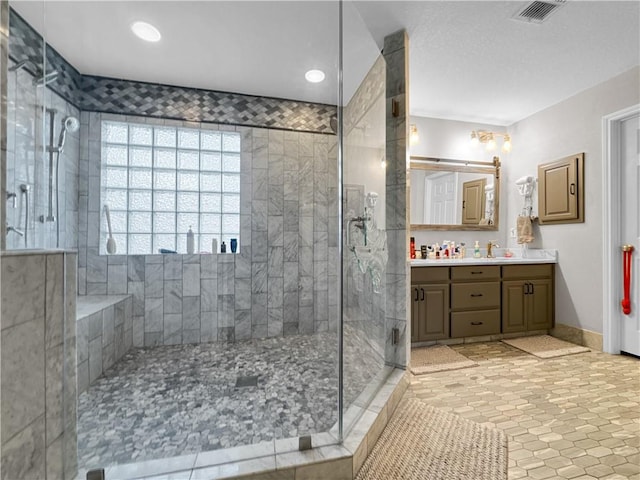 13910 Riverway Dr, Corpus Christi, TX 78410 - full bath with vanity, a stall shower, tile patterned floors, and recessed lighting