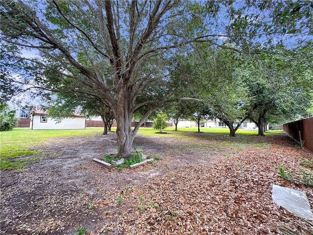 13910 Riverway Dr, Corpus Christi, TX 78410 - view of yard with an outbuilding