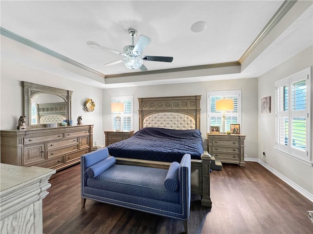 13910 Riverway Dr, Corpus Christi, TX 78410 - bedroom featuring wood finished floors, a tray ceiling, ornamental molding, and ceiling fan