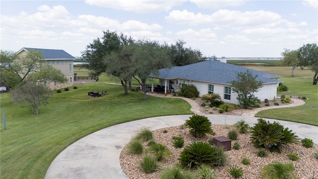 exterior space featuring a front yard