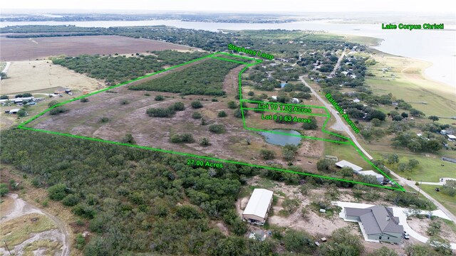 aerial view featuring a rural view and a water view