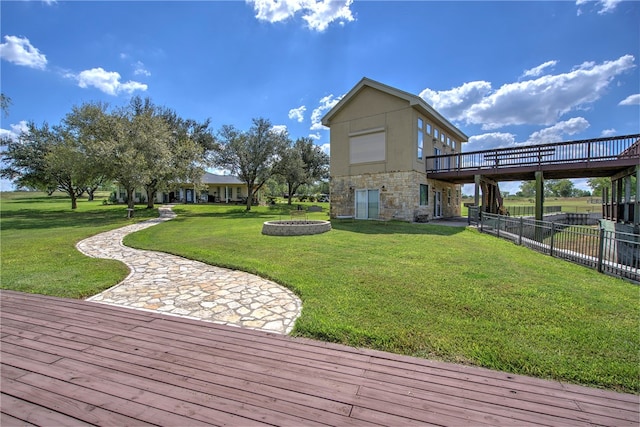 view of yard featuring a wooden deck