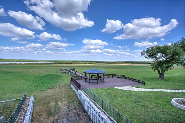 view of home's community with a yard and a gazebo