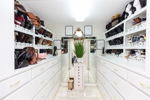 11157 Jackson Ter, Corpus Christi, TX 78410 - walk in closet with light marble finish floors