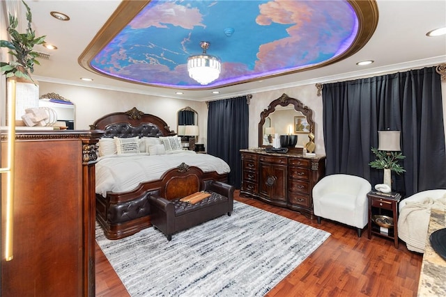 11157 Jackson Ter, Corpus Christi, TX 78410 - bedroom featuring a tray ceiling, wood finished floors, ornamental molding, and recessed lighting