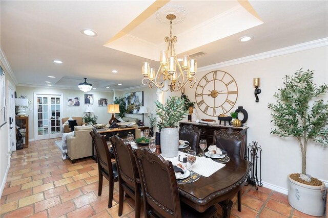 11157 Jackson Ter, Corpus Christi, TX 78410 - dining space with a raised ceiling, ornamental molding, a chandelier, and recessed lighting