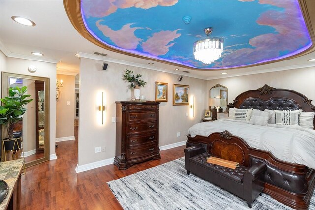 11157 Jackson Ter, Corpus Christi, TX 78410 - bedroom with a tray ceiling, wood finished floors, ornamental molding, and recessed lighting
